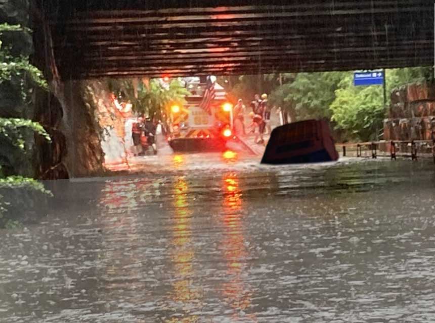 Vehicle submerged in underpass