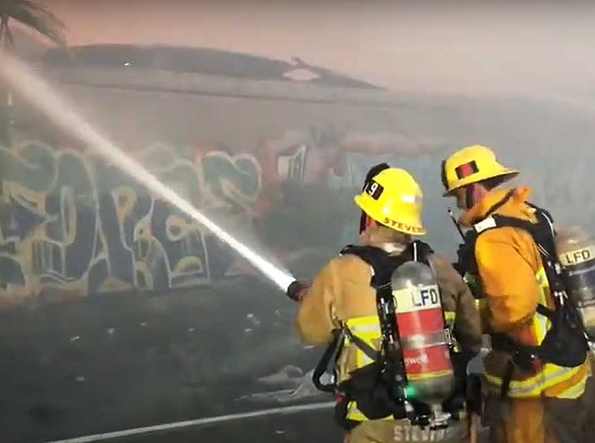 LAFD firefighters put major stream on outside of building