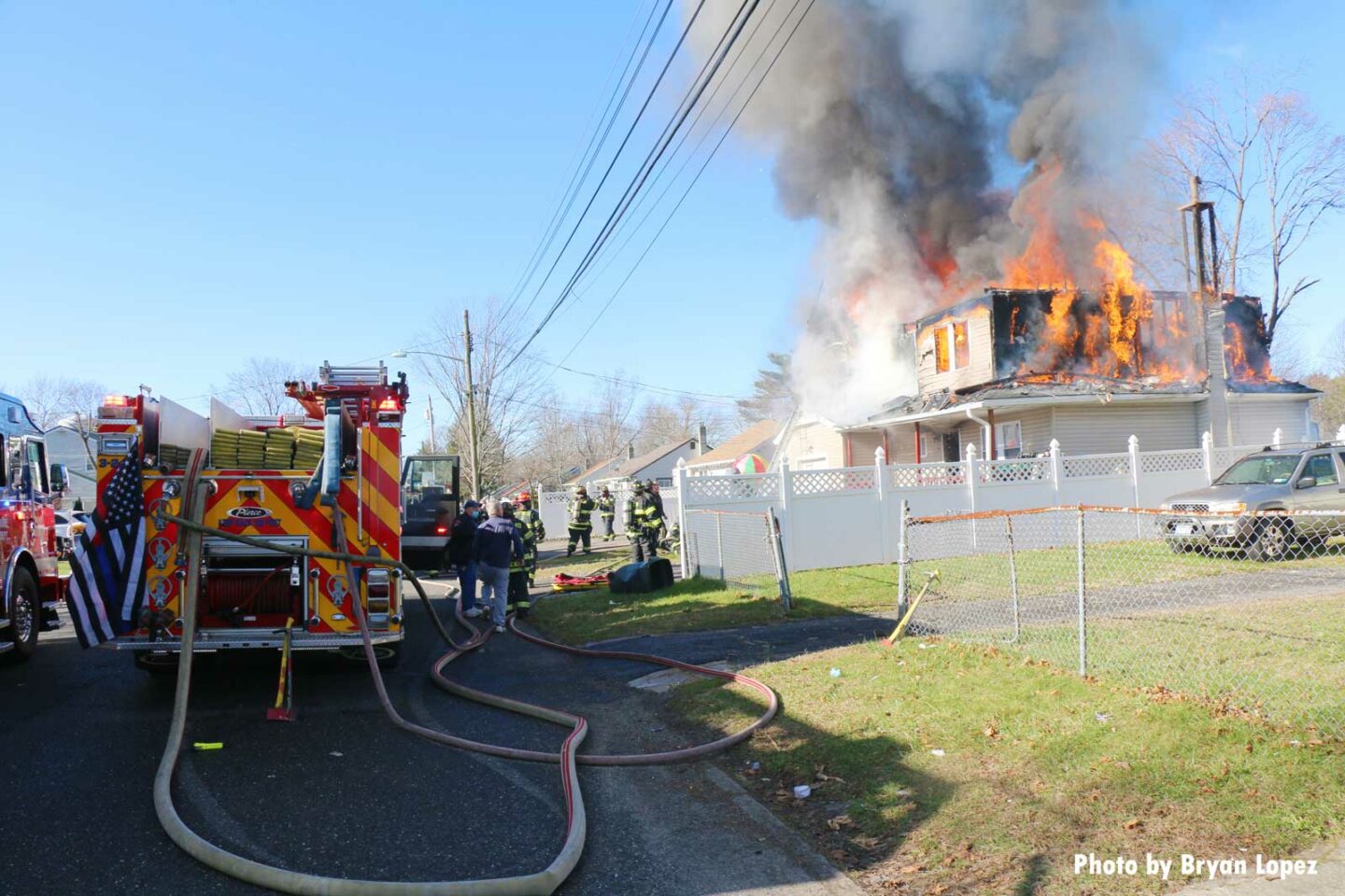 Firefighters arrive on scene at Long Island fire