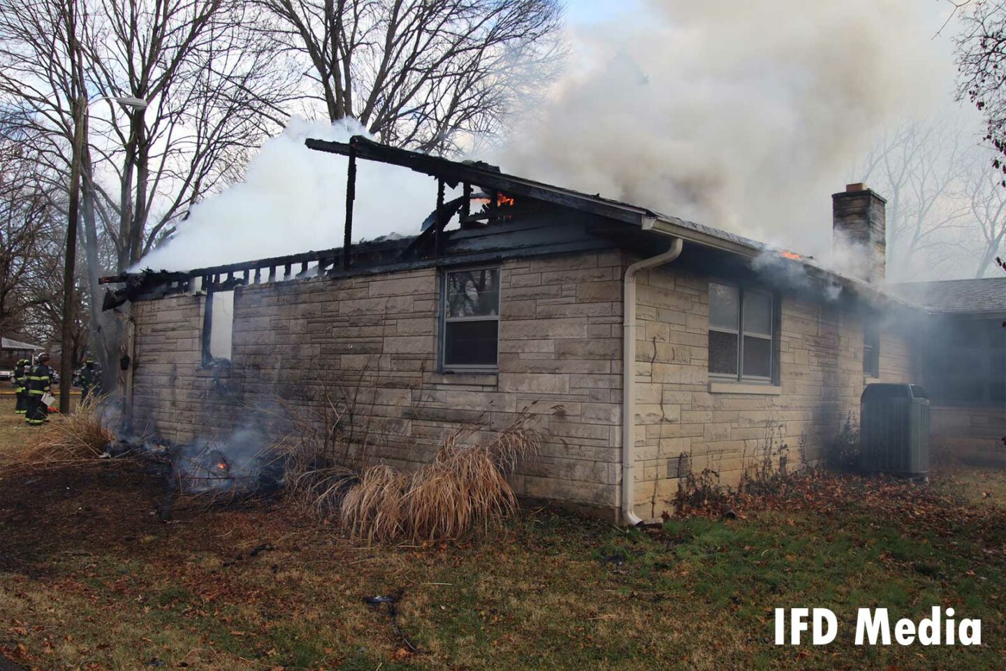 A view of the home after flames have been knocked down