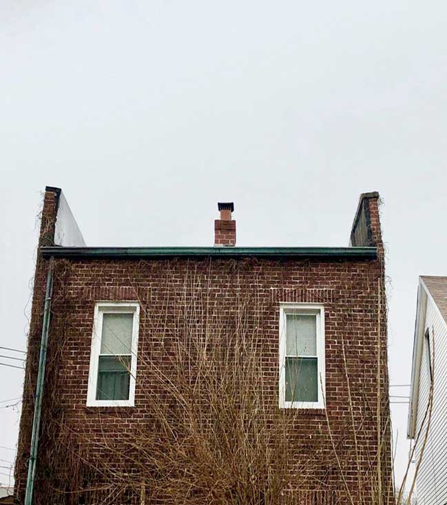 Parapet on multiple sides of a building