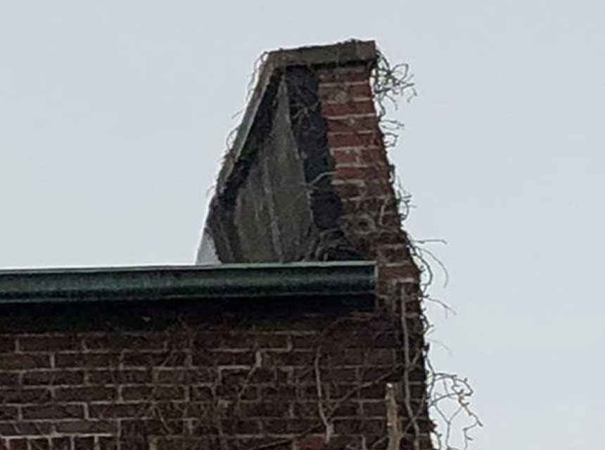 Parapet warped due to the elements