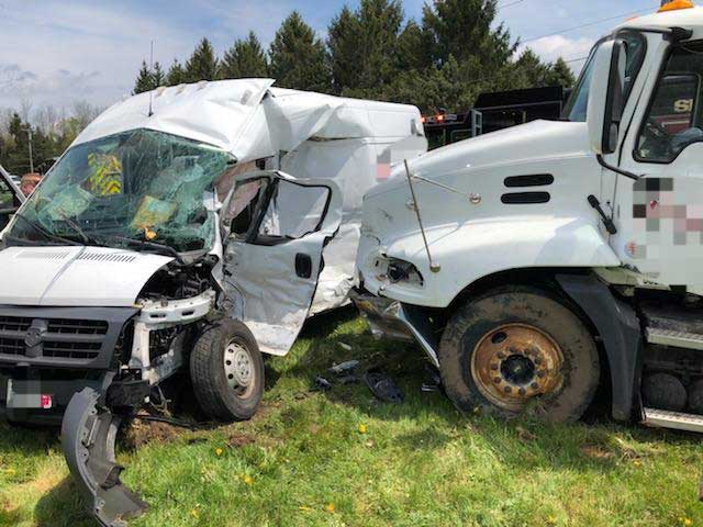 Truck versus delivery van crash