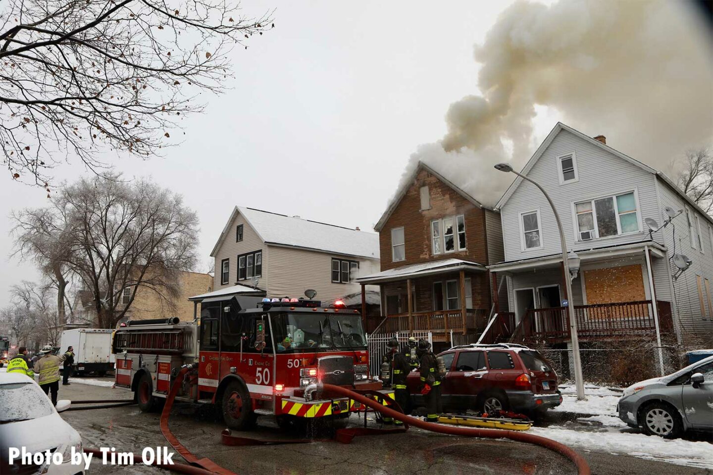 Smoke coming from the top of a house fire in Chicago