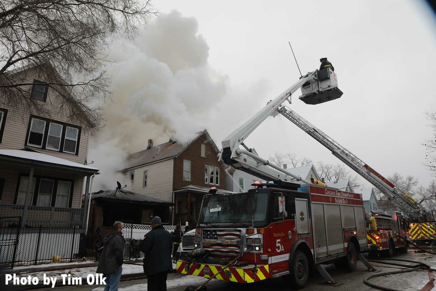 Chicago Squad 5 and tower ladder at a house fire