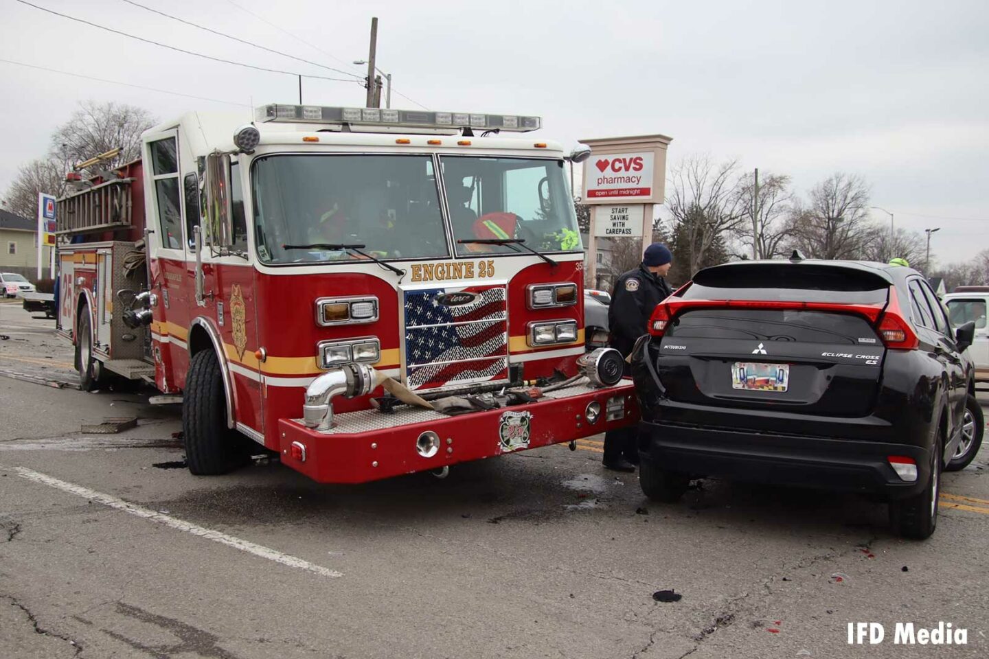 Indianapolis fire apparatus involved with car