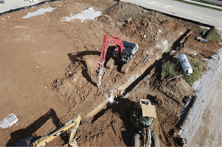 Trench work to install pipe and structures.