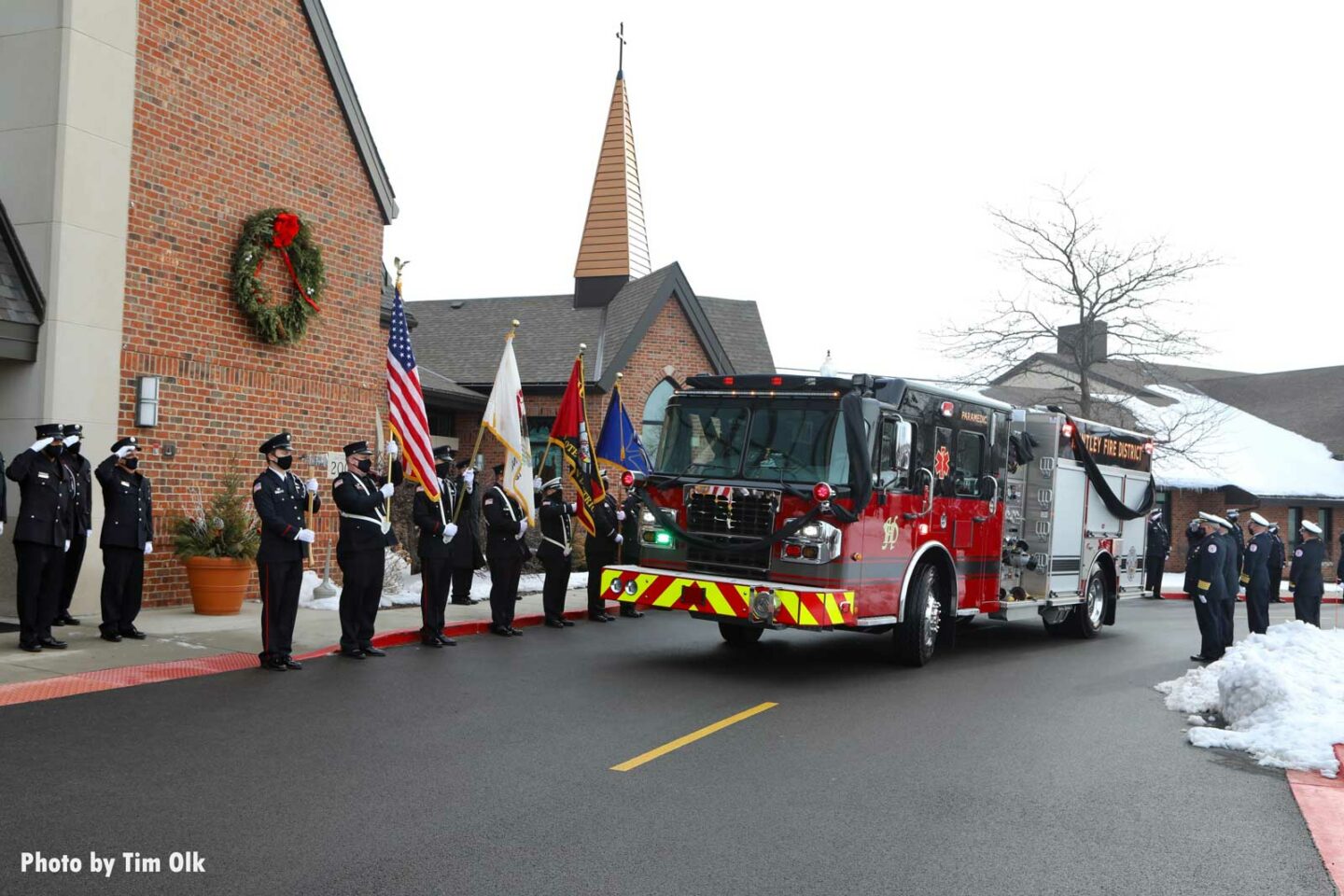 Fire apparatus arrives at services for Al Schlick