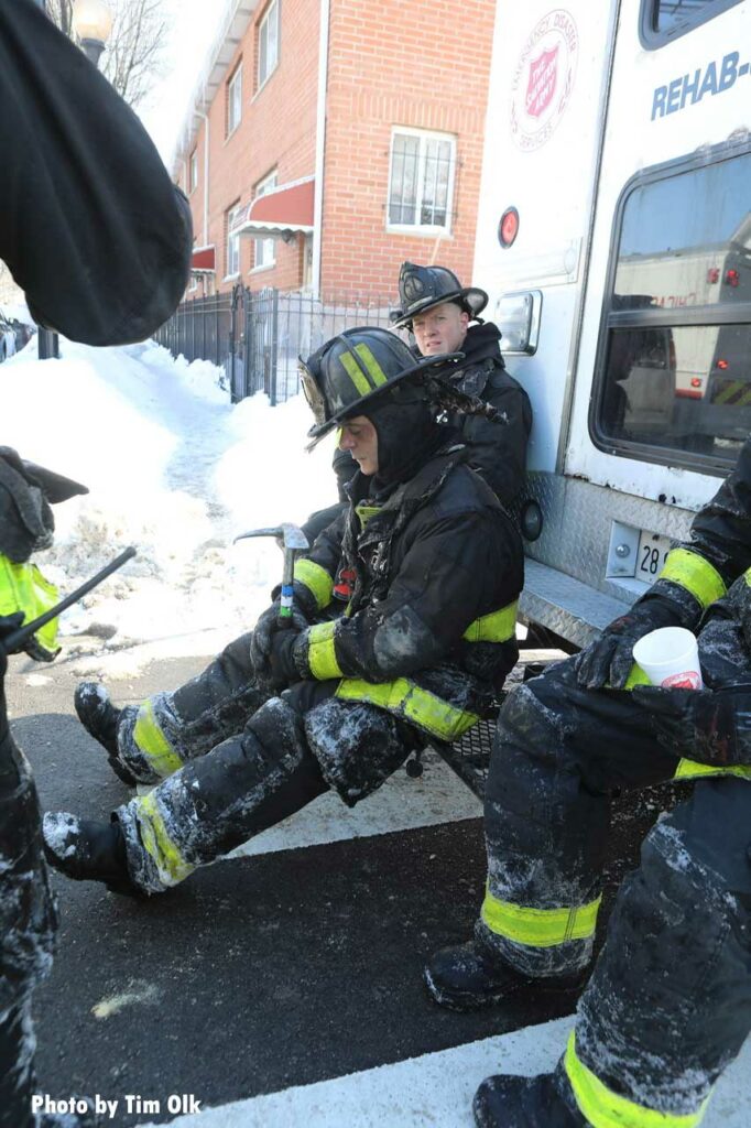 Chicago firefighters rehab at fire scene