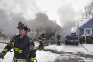 Firefighters at the scene of a working fire in Dearborn, Michigan