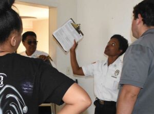 Fire marshal advising residents on fire safety