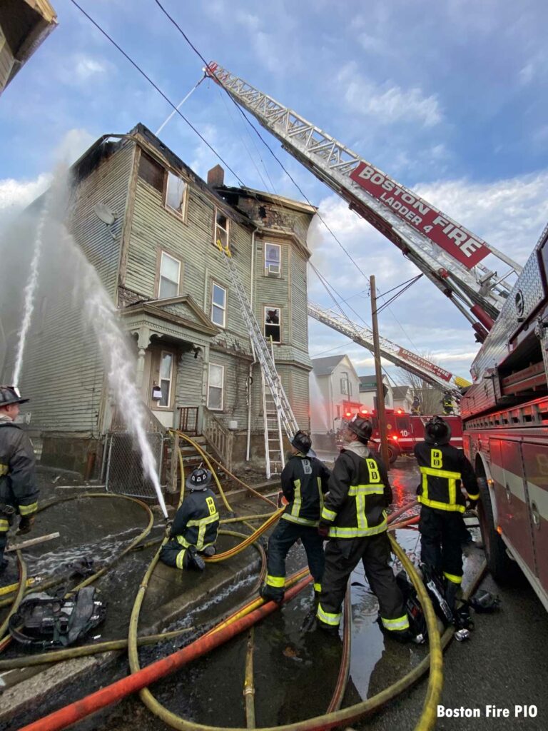 Boston aerial ladder putting water on fire building