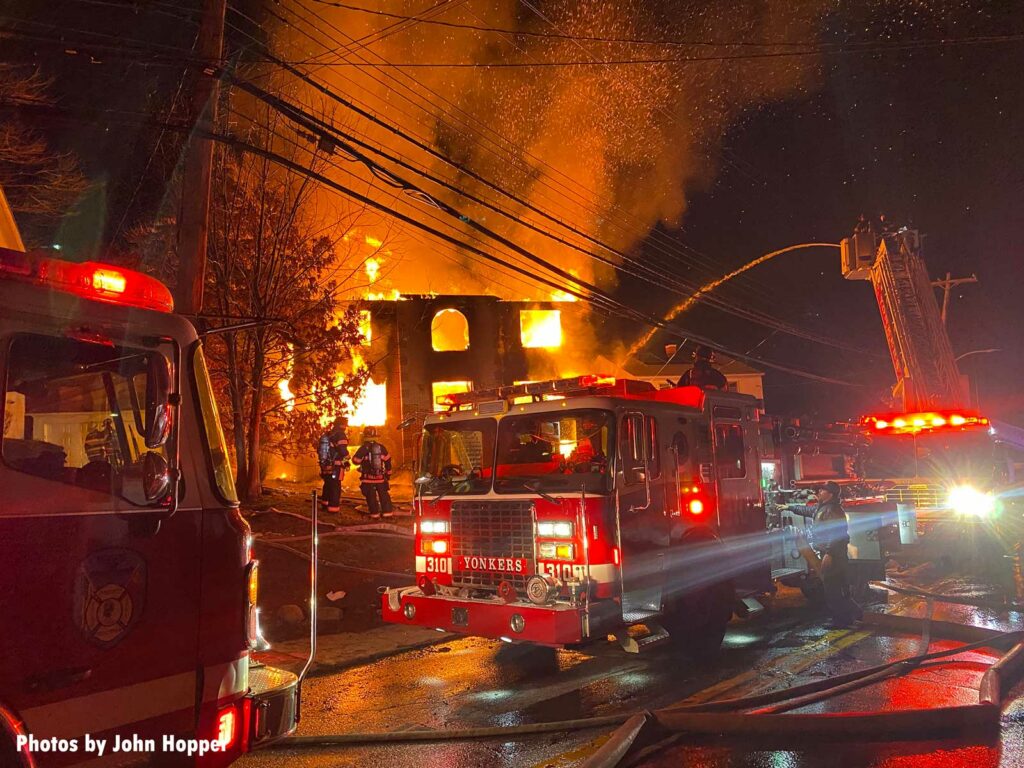 Yonkers fire apparatus and firefighters at the scene of a structure fire