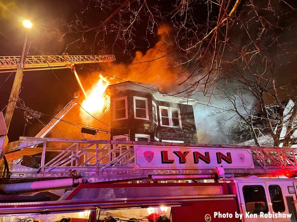 Lynn aerial with multiple other aerials at work at structure fire