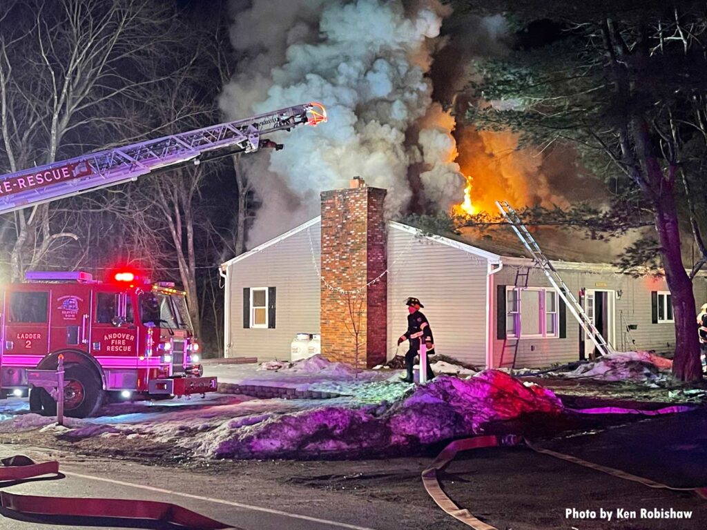 Andover Fire Rescue aerial over house fire with smoke and fire showing