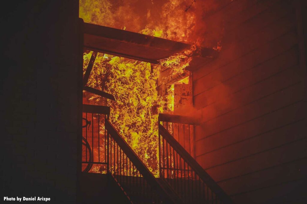 Flames roar from doorway at fire in Texas apartment complex