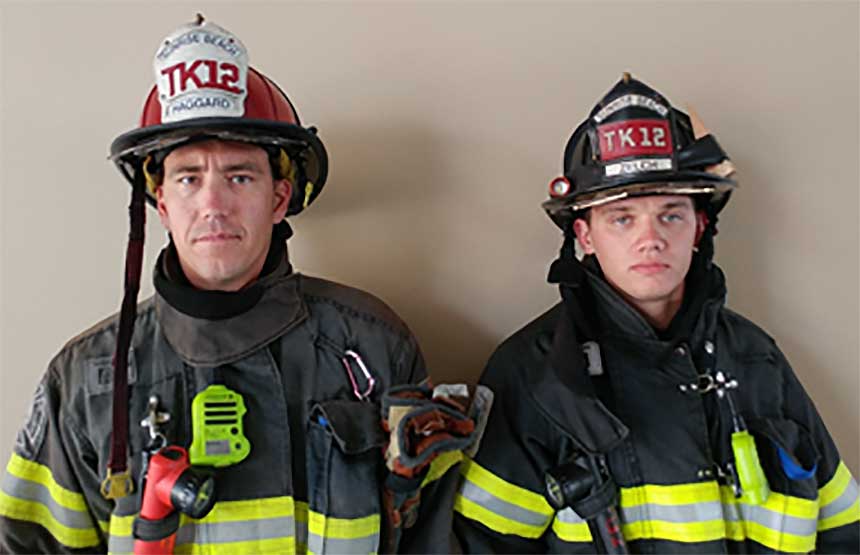 Helmet shield on fire captain and firefighter