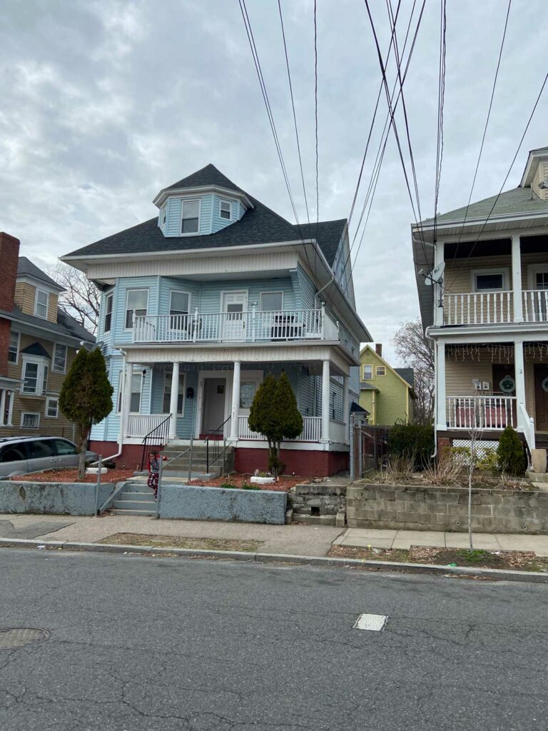 view of power lines and distance between porches