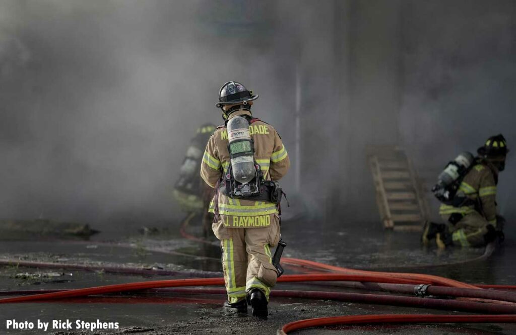 A Miami-Dade firefighter at the warehouse fire