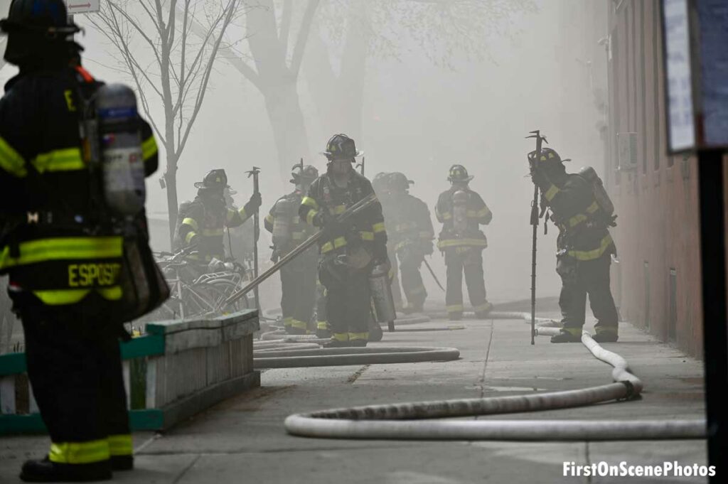 Firefighters at the scene of a huge fire in Queens