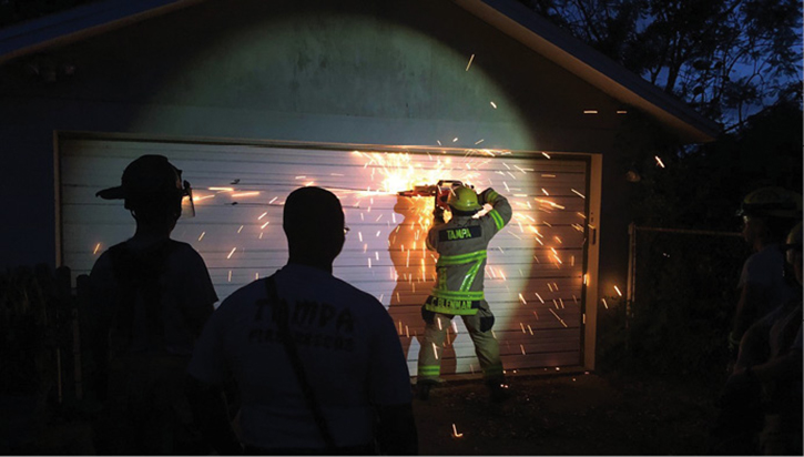 Firefighters were able to make multiple cuts on a metal garage door, which enhanced their power tool skills.