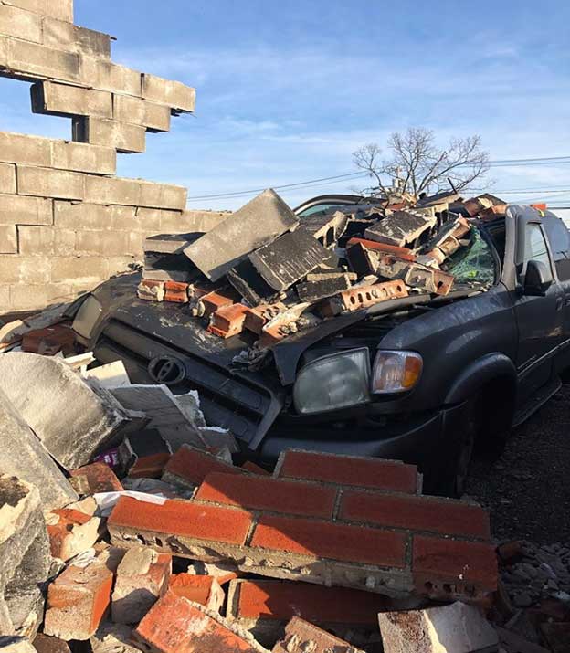 Load-bearing concrete block and masonry veneer walls