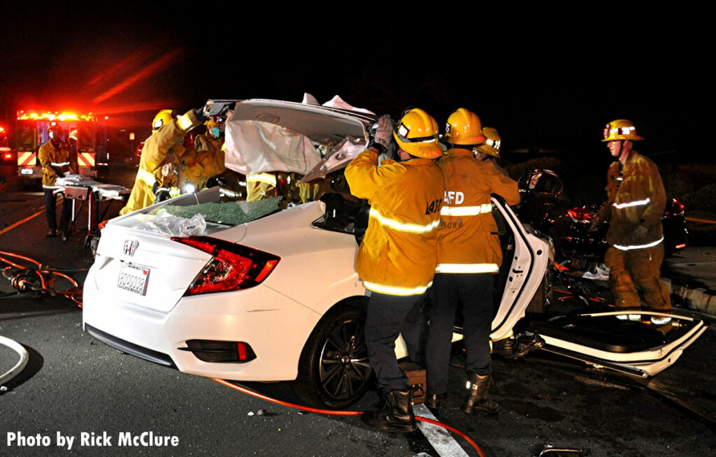 LAFD firefighters remove roof of vehicle