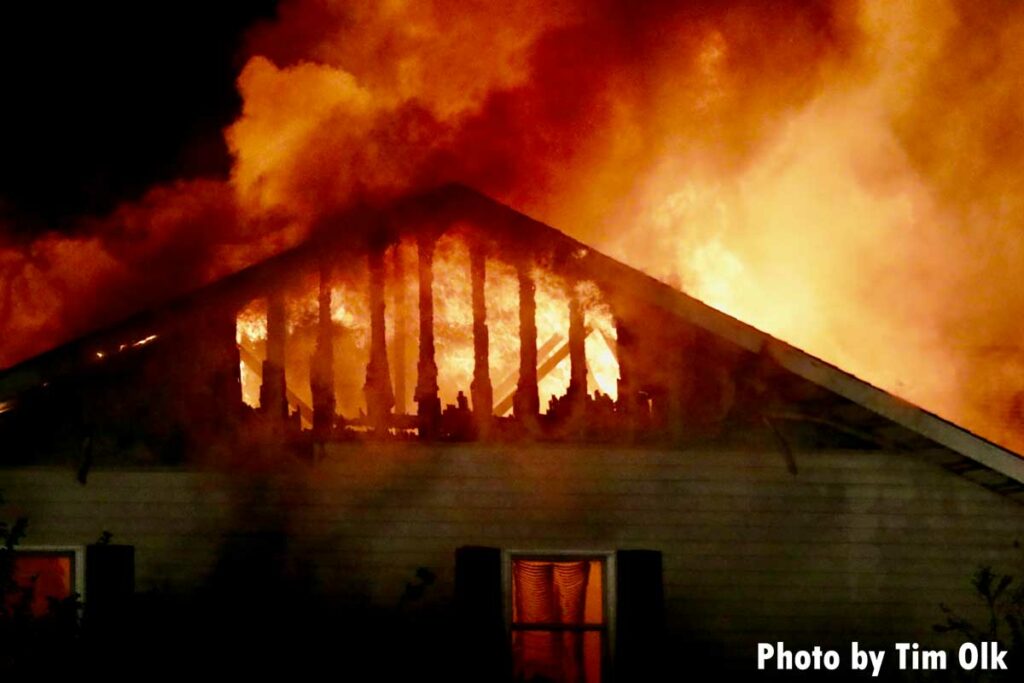 Flames tear through top of home in Danville, Iowa