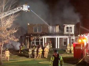 Firefighters at the scene of a structure fire