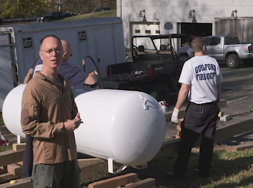 Jeff Chandler and company on flaring a 325-gallon propane cylinder