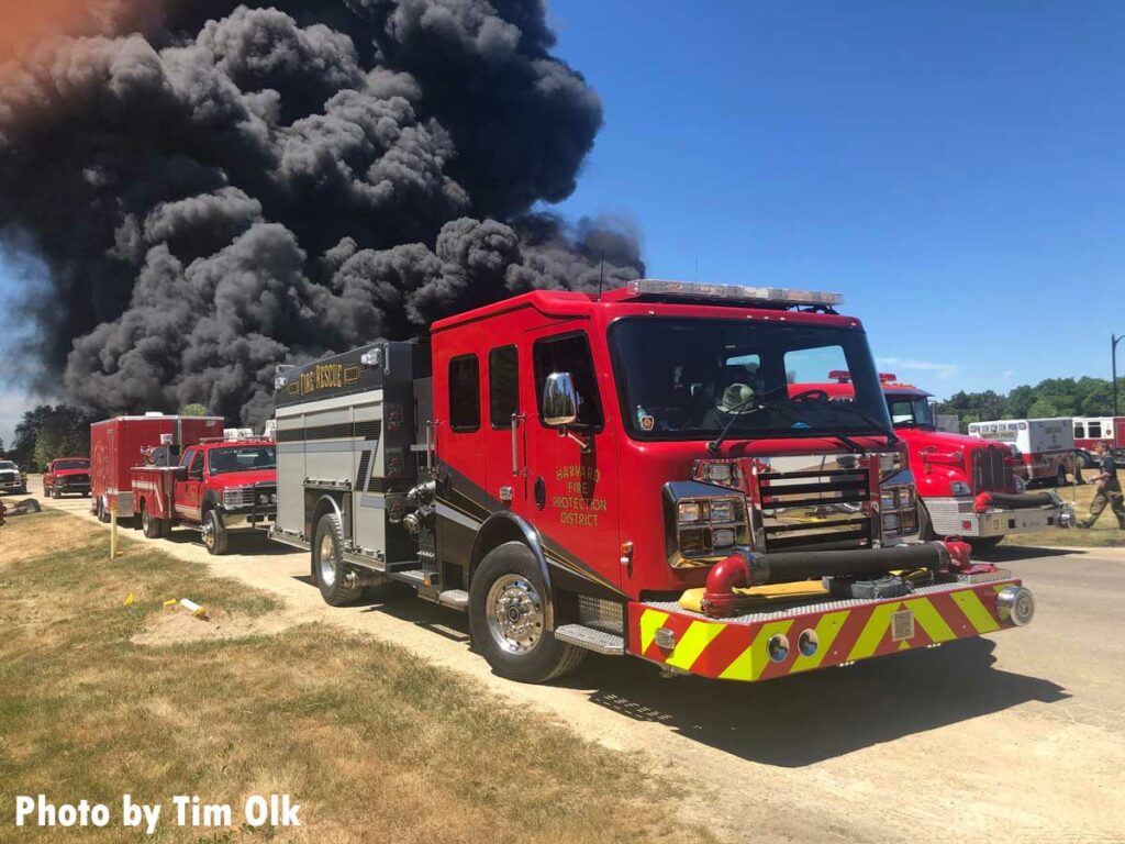 Harvard Fire Protection District apparatus in front of huge smoke cloud