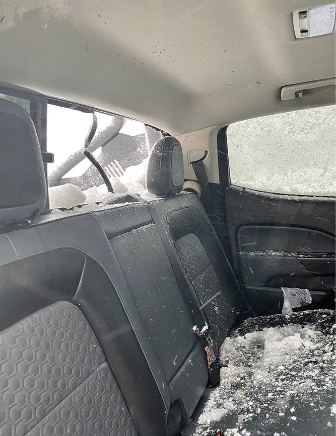 The center sliding window opening was 12 inches wide × 10 inches tall. The fixed window to the right was shattered to pull the male occupant through after he was underwater for 35 seconds.