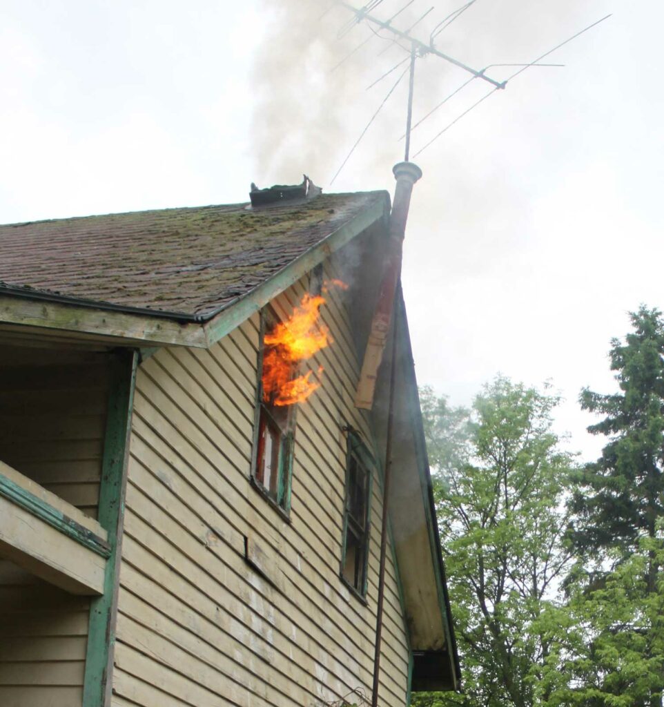 Flames shooting from a window