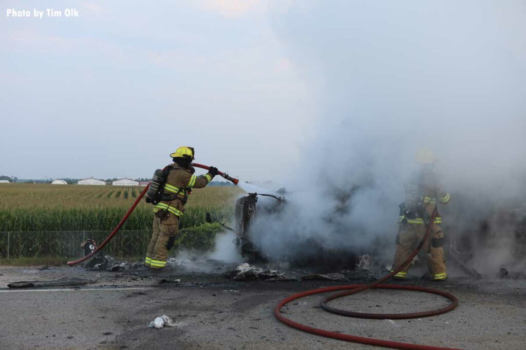 Firefighters get close to the semi cab fire