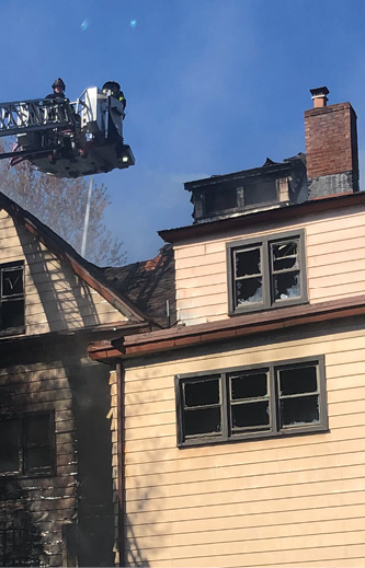 When operating from the tower ladder’s bucket in the vicinity of the chimney, always be wary of its condition and anticipate it could collapse at any moment.