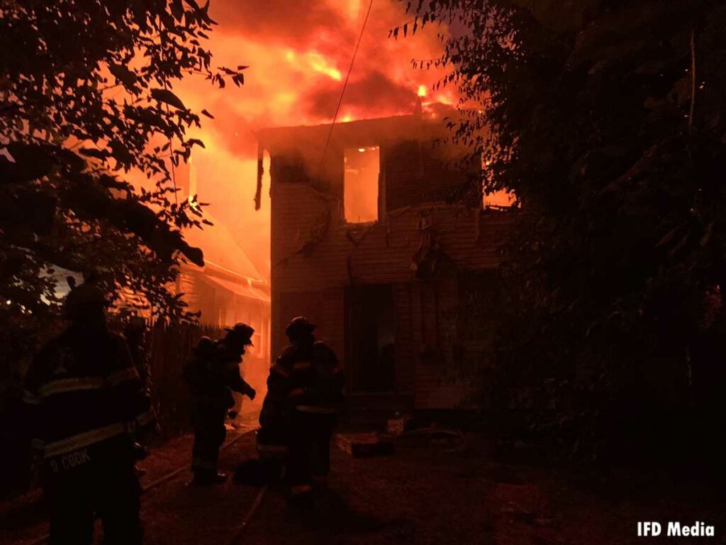 Home silhouetted by flames in Indianapolis