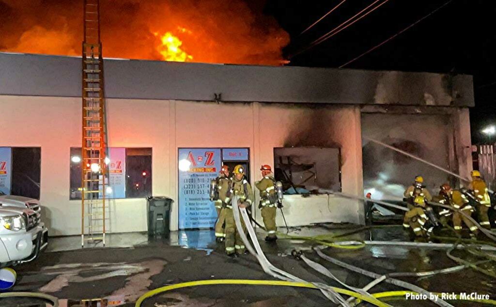 LAFD crews manage hoselines at structure fire