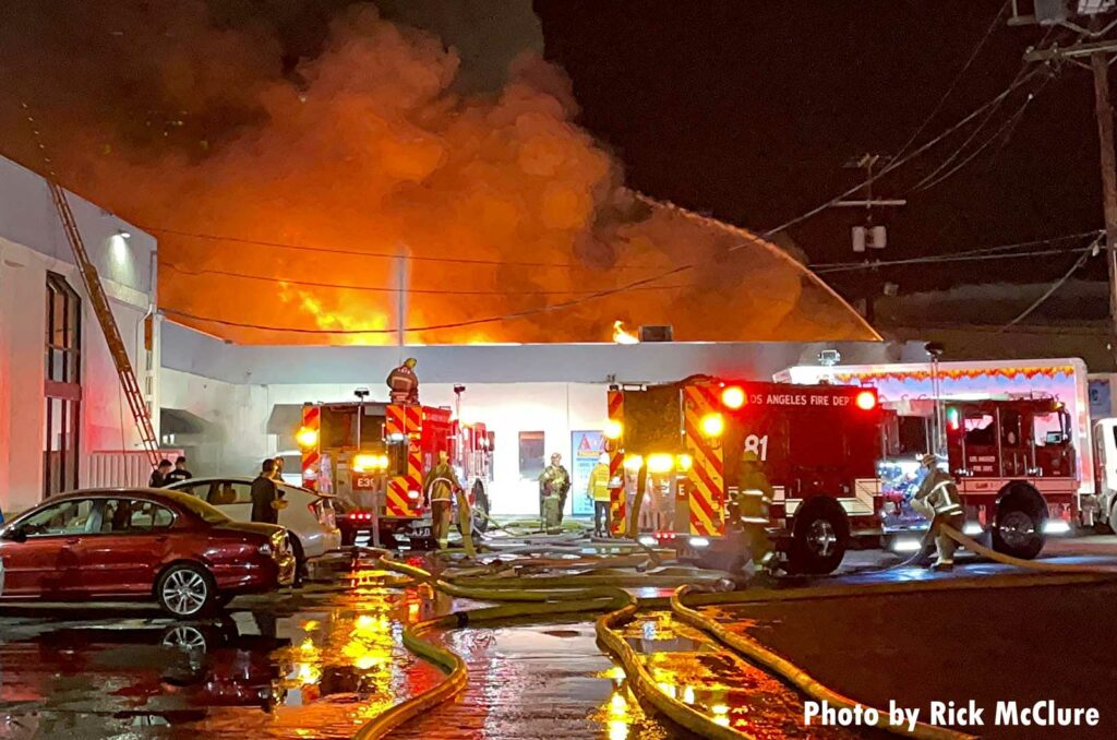 Structure fire with fire apparatus and firefighters in Los Angeles City