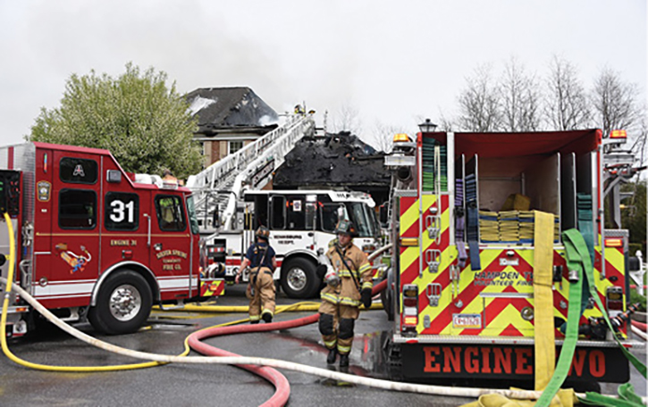 (5) A forward lay by the first-arriving engine builds in contingencies and ensures a water supply regardless of the fire volume encountered. (Photo by Jason Coleman-Cobb.)