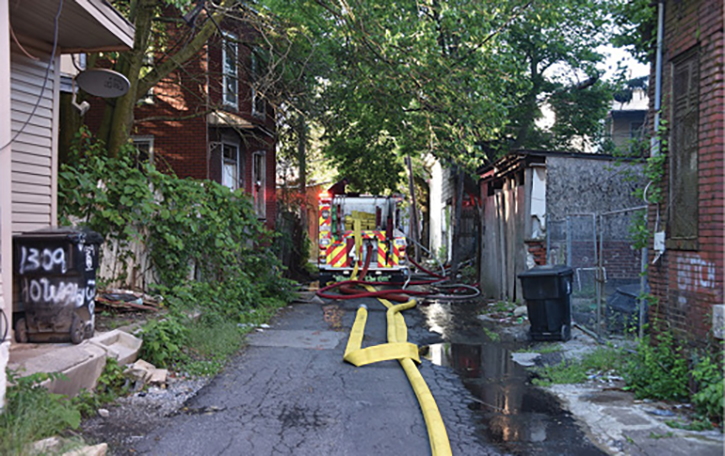 (7) Setting up your water supply evolutions to require the fewest engine companies allows for tactical flexibility. Without being otherwise constrained, the third and fourth engines are available to establish a secondary water supply and take alternate positions such as a rear alleyway or other C-side access. (Photo by Jason Coleman-Cobb.)