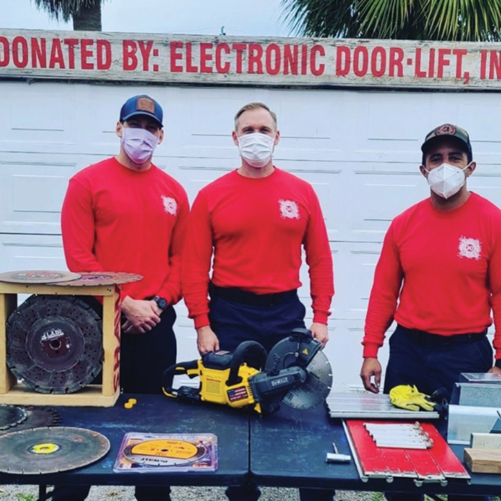 (4) I (center) co-teach with two members of the FLFR RIT Competition team. 