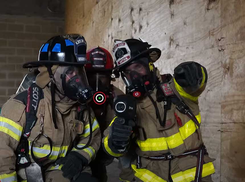 Firefighters performing search with a TIC