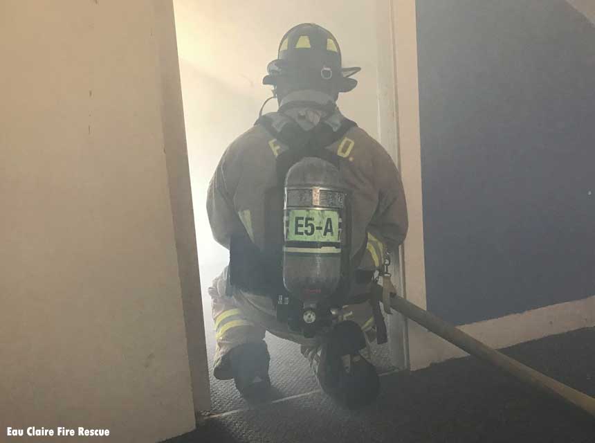 Firefighter in a smoky doorway