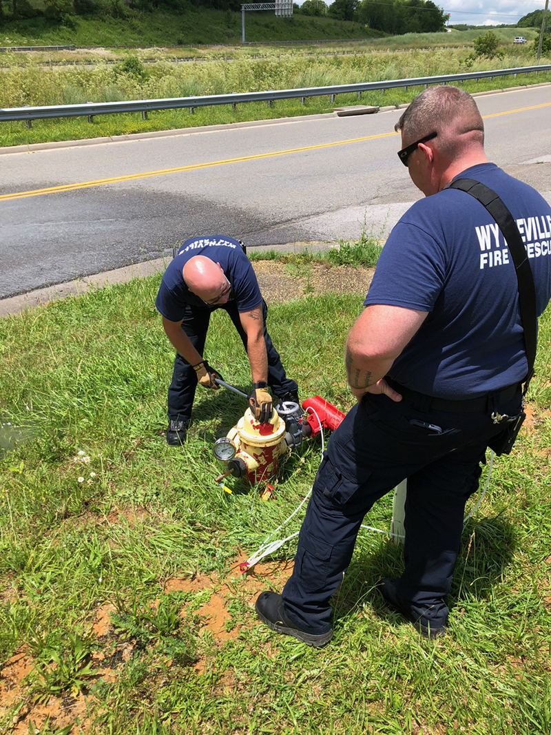 Members of the Wytheville (VA) Fire Department use proper hydrant testing equipment to obtain accurate flow test results.