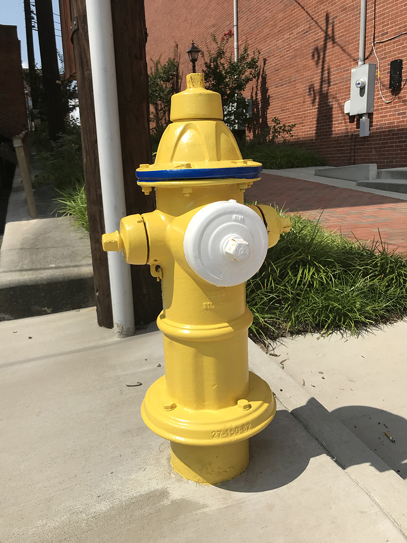 his hydrant with a white steamer cap indicates that an adapter will be needed. It’s a simple way for firefighters to identify it, especially in the middle of the night. The reflective tape around the bonnet signifies the tested flow rating and allows for easy identification at night too.