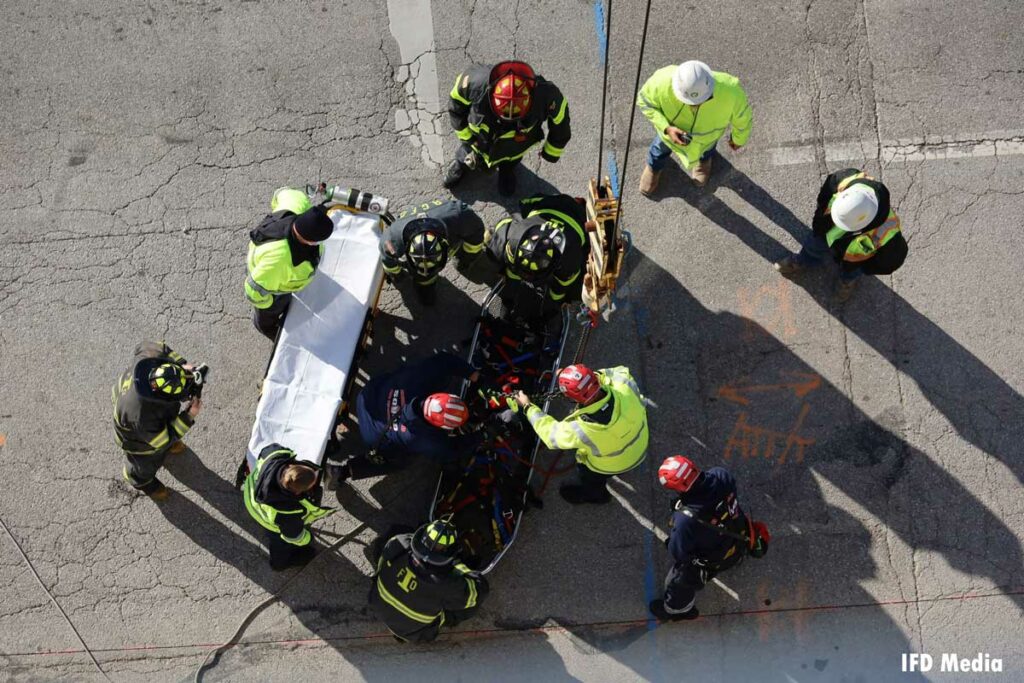 Indianapolis firefighters rescue an injured worker