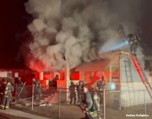 Stockton firefighters work at a house fire in October 2021