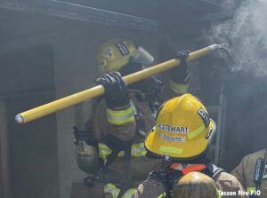 Tucson firefighter with pike pole