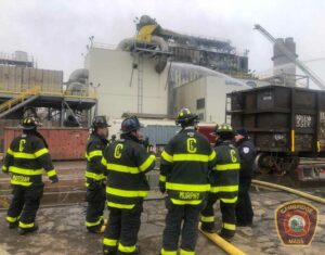 Cambridge MA firefighters at four-alarm Everett fire