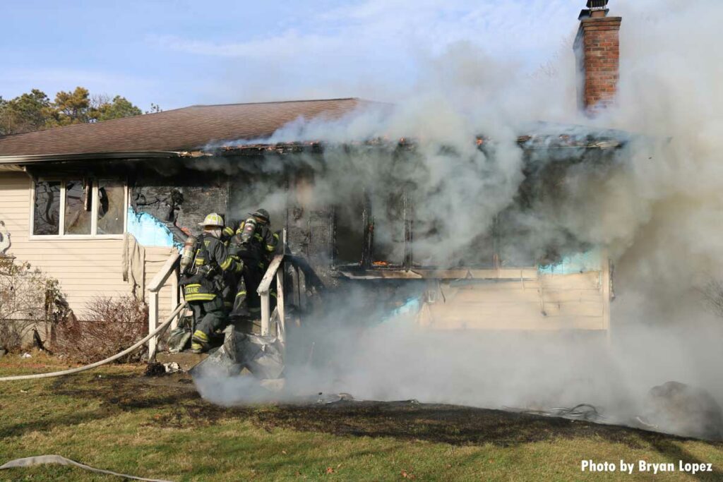 Smoke from front of Long Island house fire